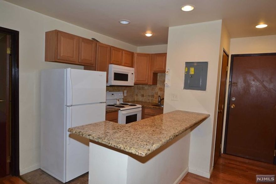 Spacious one bedroom apartment offers newer kitchen with granite counter tops and full bath. Has one assigned parking space and is conveniently located near NYC transportation, schools, parks, and worship. Landlord will take care of water and lawn care. Tenant responsible for electric, gas, and snow removal. No pets. Schedule a viewing today!