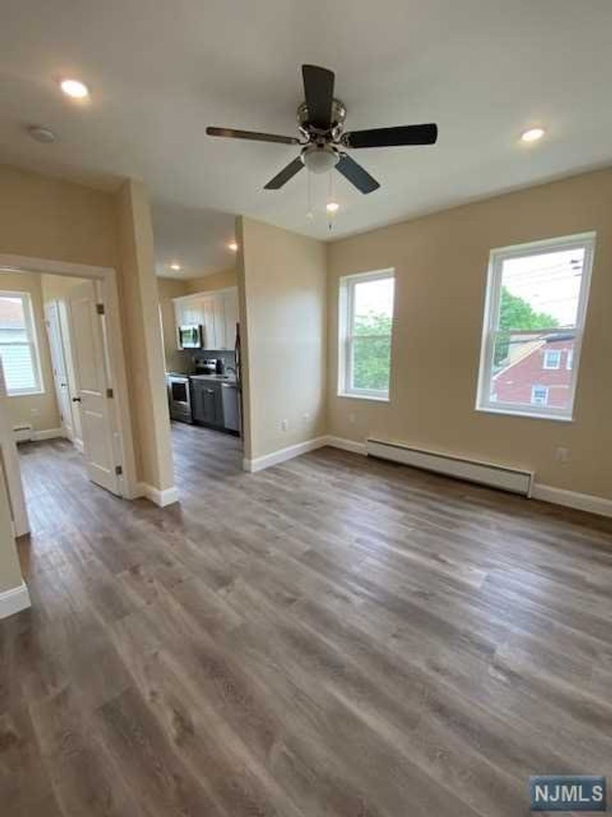 Beautiful fully renovated high ceiling one bedroom apt. New appliances, New hardwood floor, New bathroom, New windows, New ceiling fan.Laundry in the building. Minutes away from Rt46,95,80,17,3. Close to NY transportation.