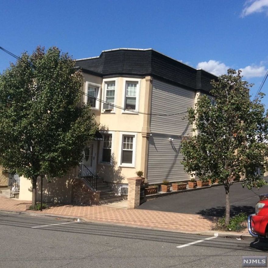 Fully renovated 3 bedroom apartment in a 3 family home with nice patio being shared by tenants, laundry area and storage in the basement and one parking space available. Bathroom completely gutted and redone, kitchen redone 3 years ago with granite countertops and ss appliances. Sunroom off the main bedroom and beautiful hardwood floors all through the apartment. Pets under 25 pounds allowed.