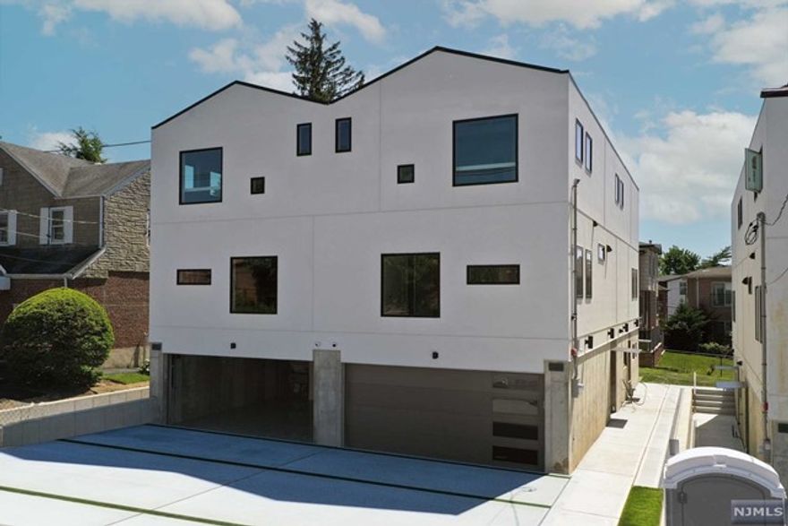 An architectural masterpiece of a duplex situated on a prime location of Palisades Park. This never before seen and innovative duplex is constructed from ground up by a reputable builder with the utmost detail for modern touches along with a chic design inspired entirely by luxury European lifestyle. This residence is truly exceptional. Including the state-of-the-art kitchen featuring a Bertazzoni stainless steel appliances, & tremendous amount of prep space & European brand cabinetry, quartz & wood countertops, & Elfa pantry shelving system, & high end LED lighting fixtures, & Modern mahogany entry door, & Solid core interior doors with Emtek door handle, & Luxury white oak wood flooring, & Aquasana water filtration system, & LG laundry & dryer, & Samsung styler in walk-in closet, & Porcelanosa & Glohe fixtures & bathroom accessories, & Pet stainless steel washing station, & Fire sprinkler, Fire alarm, Burglar alarm, Security camera with Nest doorbell system, and Samsung DVM HVAC