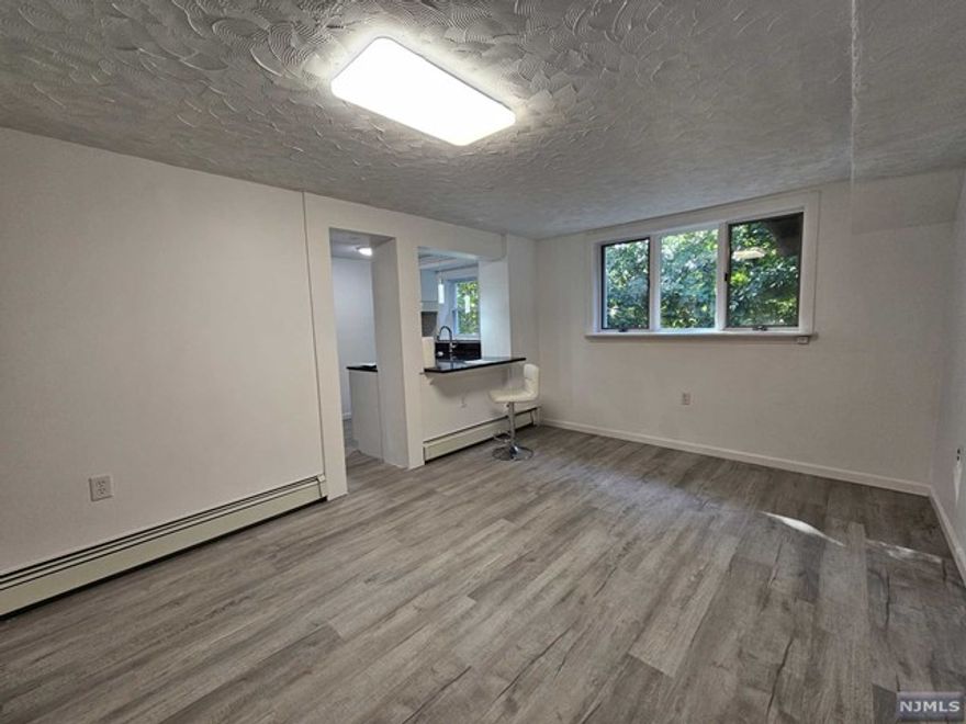 All utilities included in the unit, 2Beds and 1 Full-Bath, Large patio and Deck on a quite place. Completely renovated kitchen, bath, 2bedromms, lots of light and window. Close to NYC transportation, downtown and schools. Thank you for showing.