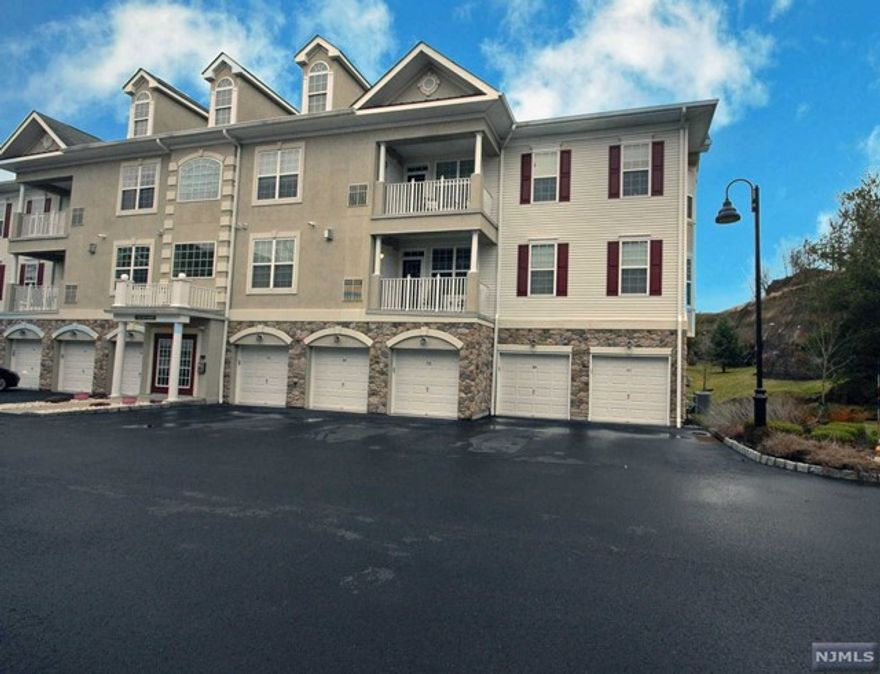 Sought after BEGONIA model with the upgrades you desire in a premier gated community! All one level with an ideal layout offering privacy between the bedrooms. An impressive kitchen with custom cabinetry, granite countertops & backsplash in the perfect blend of colors. The primary bedroom suite has a large walk-in closet & luxurious bathroom full of natural light. Features include hardwood floors, upscale lighting, accent trims, specialty tiles, wood shelf/drawer closet organizers, private garage w/storage room & balcony with a view of the beautiful grounds. Resort style living with a 25,000 sq. ft. clubhouse and the best amenities: indoor/outdoor pool, tennis, pickleball, putting green, fitness center, card rooms/Mahjong clubs, activities, events & more. Bordering the town of Montclair with terrific restaurants, theaters, shops & boutiques. Enjoy a carefree & comfortable lifestyle!