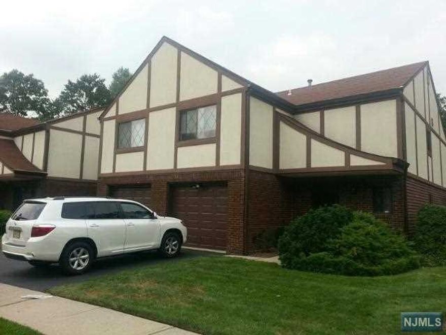 Renovated, end unit. One of the most desirable town homes in Cresskill. Bright inside & neat condition. Spacious entry foyer, modern eat in kitchen with granite counter tops & stainless steel appliances. Dining area with windows, living room with sliding glass door to patio. Hardwood floor thru out, lots of closet space. Conveniently laundry room located on second floor. Close to NYC transit, shopping, & schools.