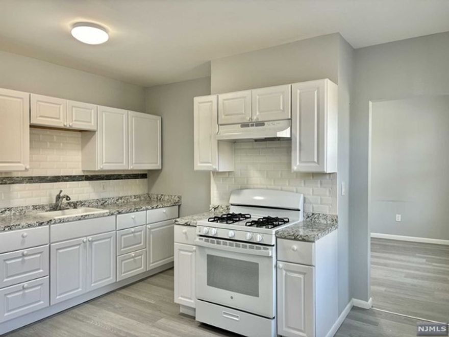 Step into this newly renovated 1-bedroom railroad apartment on the first floor, where contemporary elegance meets practical comfort. Revel in the beauty of new flooring and a stylish kitchen featuring stunning countertops and ample cabinet space. Bright, sunlit rooms enhance the welcoming atmosphere throughout. Enjoy the convenience of plentiful street parking and two parking lots right outside your door. The tranquil West Hudson Park is just a short stroll away, providing a peaceful retreat. Ideally located near Route 508 and 208, and with easy access to local shops, restaurants, places of worship, the esteemed Harrison High School, and quick connections to NYC and Hoboken via the PATH train and buses, this apartment seamlessly blends charm with convenience in a prime location. Truly a gem to reside in! Landlord requires a rental application, a credit check (good credit history essential), a background check, and proof of financial stability. *** Floor Plan Attached ***