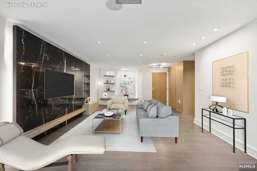 WELCOME HOME TO TOWNHOUSE 10 AT 9 ON THE HUDSON, AN EXQUISITELY UPGRADED 2 STORY TOWNHOUSE UNLIKE ANY OTHER RESIDENCE IN THE COMPLEX OFFERS A UNIQUE OPPORTUNITY TO LIVE,WORK,RELAX AND ENJOY THE FULL BENEFITS OF 40,000 SF OF RESORT STYLE AMENITIES. HOME FEATURES INCLUDE 3BEDROOM 3 BATHS WITH A PRIVATE TERRACE,BEAUTIFUL OAK FLOORING THROUGHOUT,GOURMET CHEFS KITCHEN WITH CUSTOM PEDINI CABINETRY, ASPEN QUARTZ COUNTERTOPS, BOSCH AND THERMADORE APPLICANCES,BATHROOM WITH CARRERA MARBLE, QUARTZ VANITY COUNTERTOPS AND MOEN RAIN SHOWER HEADS. RESORT LIKE AMENITIES INCLUDES A 2 STORY STATE OF THE ART FITNESS CENTER, RESIDENCE LOUNGE, INFINITY EDGE POOL BBQ AREA, VIRTUAL GOLF,CHILDRENS PLAY AREA,DOG GROOMING AND BATH AREA AND A SPRAWLING ROOFTOP LOUNGE WITH BREAKTAKING PANORAMIC VIEWS OF THE MANHATTAN SKYLINE. COMMUTERS DREAM, CONVENIENTLY LOCATED CLOSE TO NYC TRANSPORTATION, SHOPS AND RESTAURANTS. SELLER HOLDS NJ REAL ESTATE LICENSE.