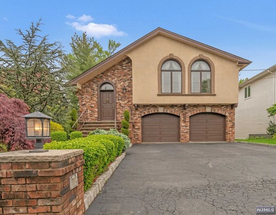 For Rent Beautiful Home located in the wonderful town of Englewood Cliffs! This home has 4 bedrooms ( 3 bedrooms upstairs and 1 bedroom on the lower level) and 3 baths with a 2 car garage. Spacious living room with Cathedral ceilings with plenty of light. Large Eat in Kitchen with sliding doors which leads to the backyard deck (perfect for entertaining) Very Large ground floor family room with another sliding door to the back yard. Large Laundry room. Baseboard heating and central air conditioning throughout. Close to NYC transportation and shopping. Tenant responsible for lawn care and snow removal. Tenant responsible 1st months rent, month and half rent for security deposit and 1 month rent broker fee.