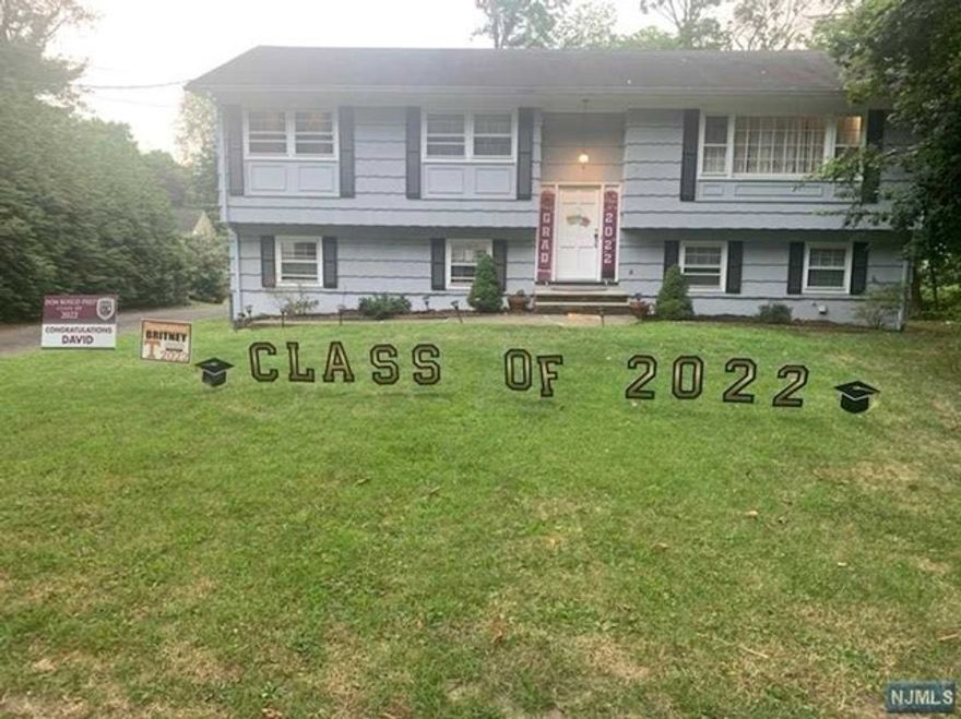 Solid, light-filled 4 bedroom and 2.5 bath bi-level home in highly sought after Borough of Ridgewood. In addition to the four bedrooms, the home has a formal living room, formal dining room, updated kitchen with stainless steel appliances, lower level family room, and attached two car garage. Other value amenities include hardwood floors, rear deck, central air, laundry area, direct lower level access into the huge rear yard, attached 2 car garage, and 1900 total square feet of living space. Reasonable pet requests will be considered. Available May 1st. Home was recently painted and carpet added downstairs. Tenants responsible for all utilities and must carry tenants' insurance.