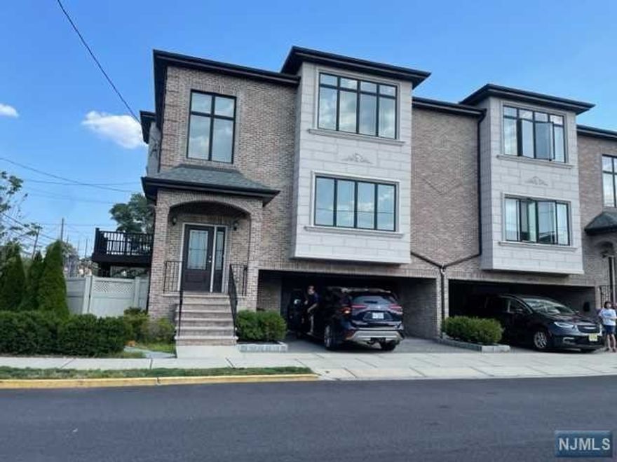 Luxury oversized half Duplex only 5 years old Town House by a reputable in a premier Location of Fort Lee. Over 2,700 Square feet living space with an elegant Fireplace on stone accent wall in Family room. Oversized island and elevated deck. master bedroom with a full spa e bathroom and his and hers walk-in closets, and a spacious ground level that has its own separate outside entrance and full bath. You will have walkable access.to stores and schools in this friendly and safe community. Enjoy both tranquilities and an exciting opportunity to rent this sweet home now. Don't miss out on the chance to flourish in this lovely new home and act now.