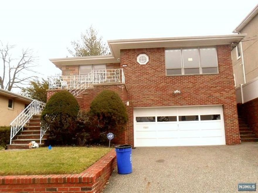 Large one family , well maintained home, 3 bedroom and 2 full bath, large eat- in kitchen door to the backyard, large living room , formal dining room, terrace in the front;ground floor large family room; bedroom/office, summer kitchen; laundry, door to beautiful well maintained backyard,2 car garage with garage opener.nice town pool, close to shopping ; ideal for extended families. **************must see********