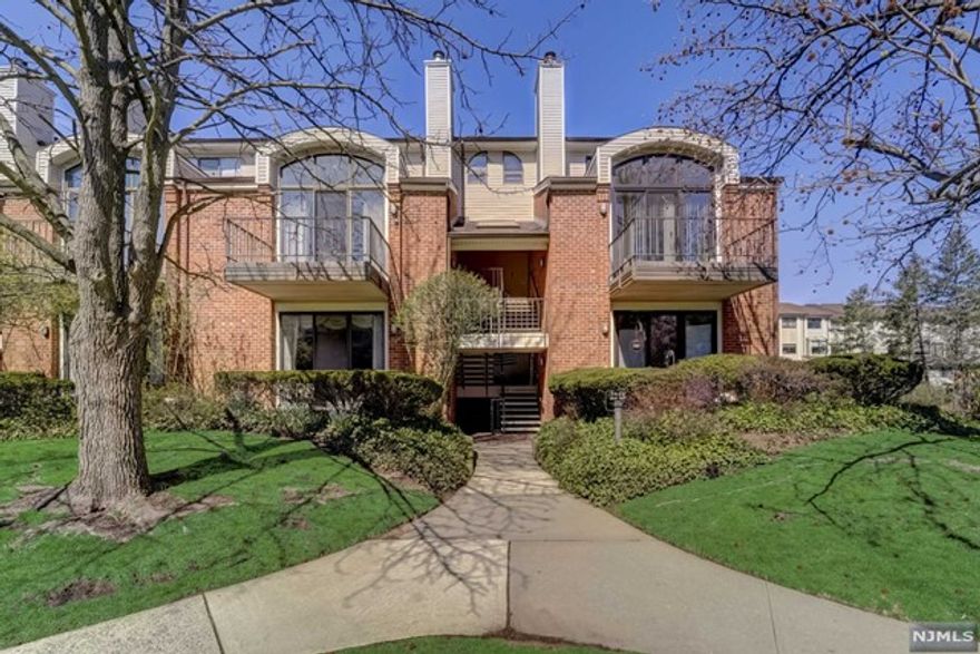 **HIGHEST and BEST offers to be in writing and submitted by Wednesday, April 20, 2022 at noon.** Beautiful, super spacious light & bright a great opportunity to own a 2 bedroom 2 full bath home in the highly desirable gated Glenpointe community! You'll instantly fall in love...a gorgeous home set in a peaceful, tranquil oasis location. Illuminated by natural light, open dining room, step down to your spacious living room with fireplace for cozy conversations and sliding door access to your private patio. The family chef will be delighted; galley kitchen with amazing cooking space and pantry. Primary bedroom suite with an abundance of closet space, en-suite spa like bath, ample sized 2nd bedroom with great closet space, additional full bath and easy access laundry. Enjoy resort-like living, two car garage parking/additional storage, plenty of parking for guests, landscaped grounds, pool, tennis courts, & clubhouse.