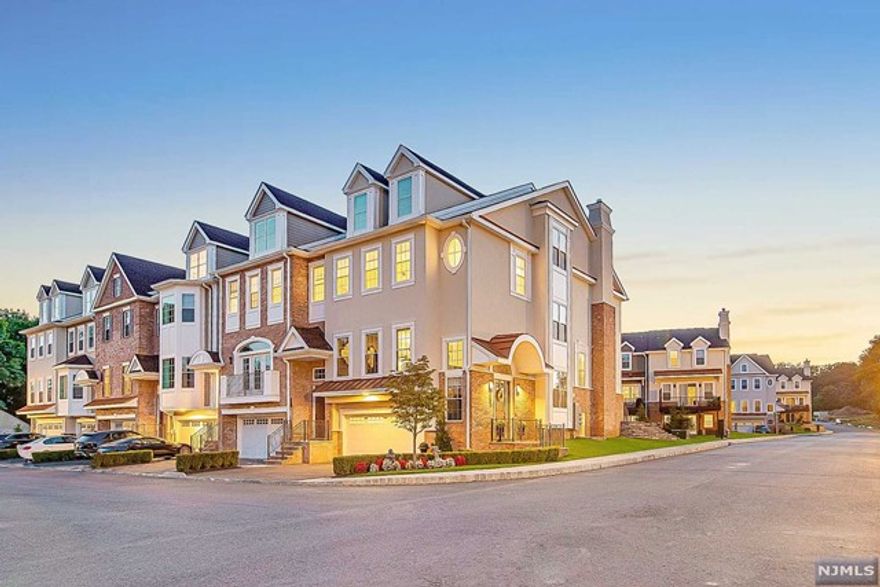 Welcome to The Alexa...ONE OF LAST REMAINING CORNER UNITS IN COMMUNITY...Main level boasts 10ft ceilings with open concept living, gourmet eat-in kitchen with quartz counters and Bosch stainless steel appliances, living room with gas fireplace, sitting room and deck. Second Floor Master Bedroom complete with walk-in closets and spa-like Master bath with glass enclosed shower, freestanding tub, and double vanities. Ground level features 2 car garage, finished recreation room or den with full bathroom. The Alexa is a gated community situated on a beautiful and enchanting 13-acre property, just off the Garden State Parkway, with easy access to New York City, public transportation, world class shopping, dining, golf, and top-rated schools. Community amenities sit on an additional 2+ acres which include Pool, Clubhouse, Tennis, Dog Park, and Playground. Available for Spring 2023. Fully built out unit with elevator included in price.