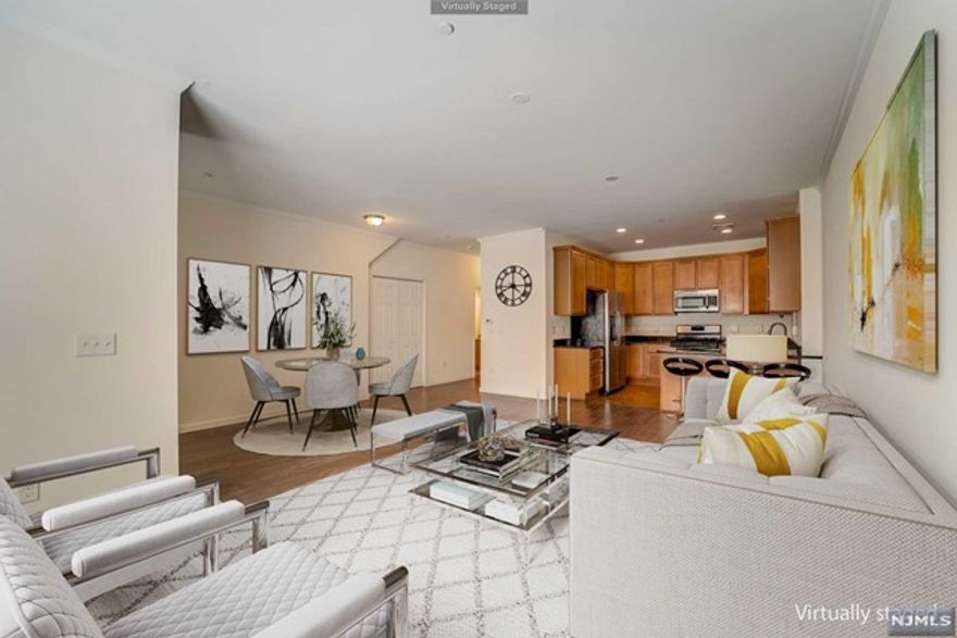 5 Year young 1 bedroom condo on a ground floor with an open concept. This unit features 1 bed 1.5 baths, hardwood floors throughout, Granite countertops, Stainless Steel appliances, high ceilings, central air and private terrace in the back. 1 assigned parking spot right at your front door and 2 additional guest spots. This is currently the only condo for sale in North Arlington, come see it today!