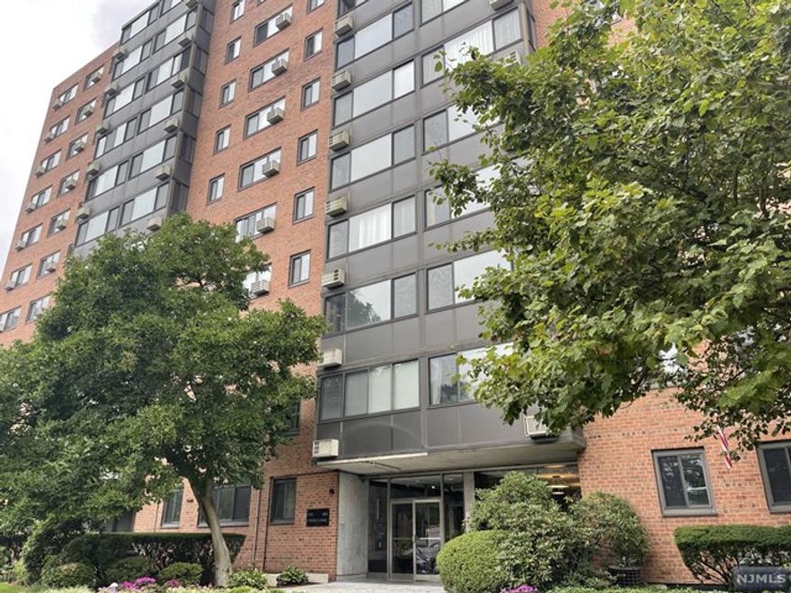 Bright and spacious 2BR 2BA unit at Frontenac, 11 story brick condo building located one block from Hackensack University Medical Center. Freshly painted. Bring your touch to make this beautiful condo your next home. The unit features hardwood floors throughout, sunroom, bright kitchen, lots of closet space. Maintenance includes 24 hours security, doorman, 1 garage space, 1 outdoor parking space, heat and hot water, even electricity. Convenient location to NYC, major highways, restaurants, shops that Hackensack offer.