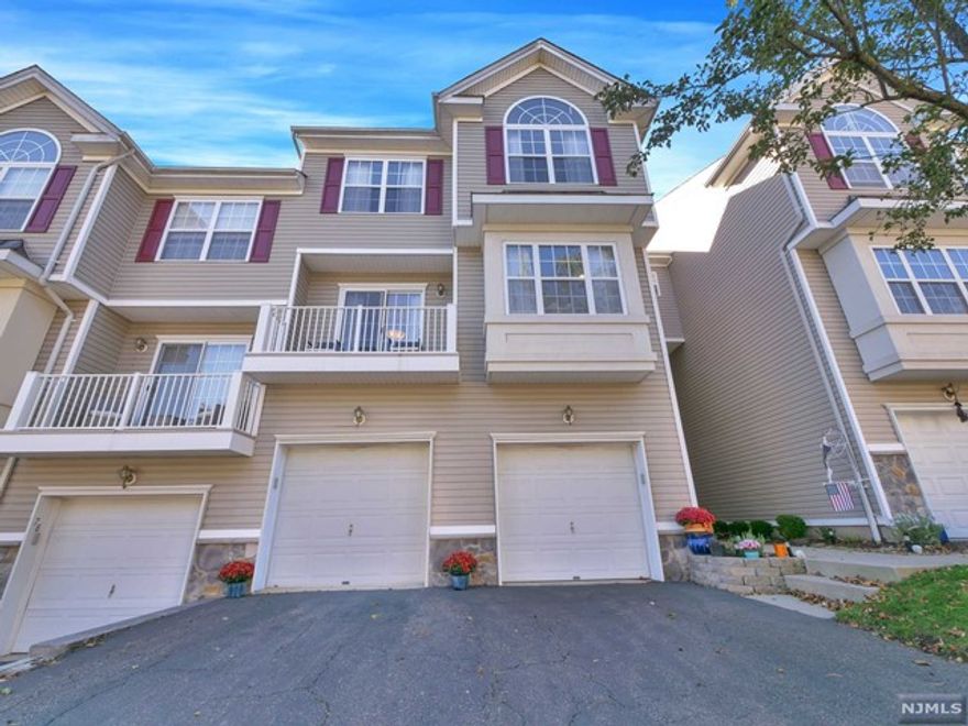 Well-maintained town home located in Summit Falls featuring 2 bedrooms and 2.5 bathrooms. Entry foyer is on the ground level and also has a garage entrance. The updated first floor offers living room, dining room and kitchen. Sliding glass doors in the dining room lead to the balcony. Kitchen offers custom cabinetry, granite countertops, stainless steel appliances and small pantry. Powder room completes the first floor. Retreat upstairs to find the primary bedroom with vaulted ceilings, large closet and en suite with double vanity, tub and stall shower with glass enclosure. The second bedroom is also located on the second floor along with a full bathroom with tub shower and storage vanity. 1-car attached garage.