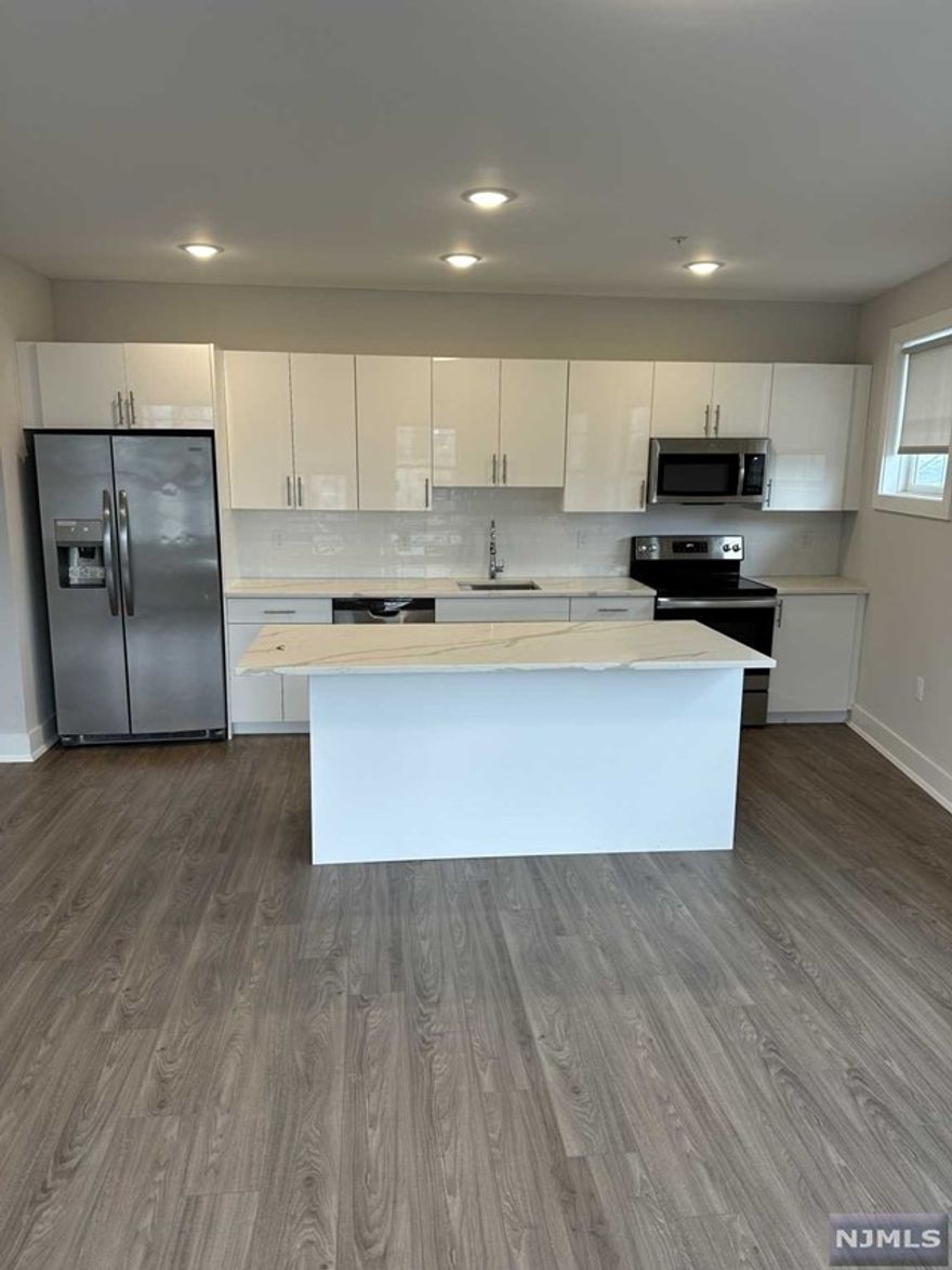 1 parking space INCLUDED, and REDUCED security to qualified applicants - Welcome to The Addison - Fort Lee's new luxury rental building offering a variety of upscale, spacious floorplans. The Addison offers high-end residences fully equipped w/ modern kitchens w/ stainless steel appliances, quartz countertops, full islands & tiled backsplashes, open living/dining areas, shades on all windows, modern bathrooms & a full-sized washer & dryer in each unit. Exclusive 24/7 virtual doorman service for communications, package deliveries & access control via video intercom system linked to your smart phone. The Addison includes a large on-site fitness center including virtual touchscreen workout mirror, electric car charging stations & parking garage w/ direct elevator access to all residences for uncompromising security. Pet friendly ! (LB limit & fees apply) Tenants pay utilities. All amenities & one garage parking space is included.