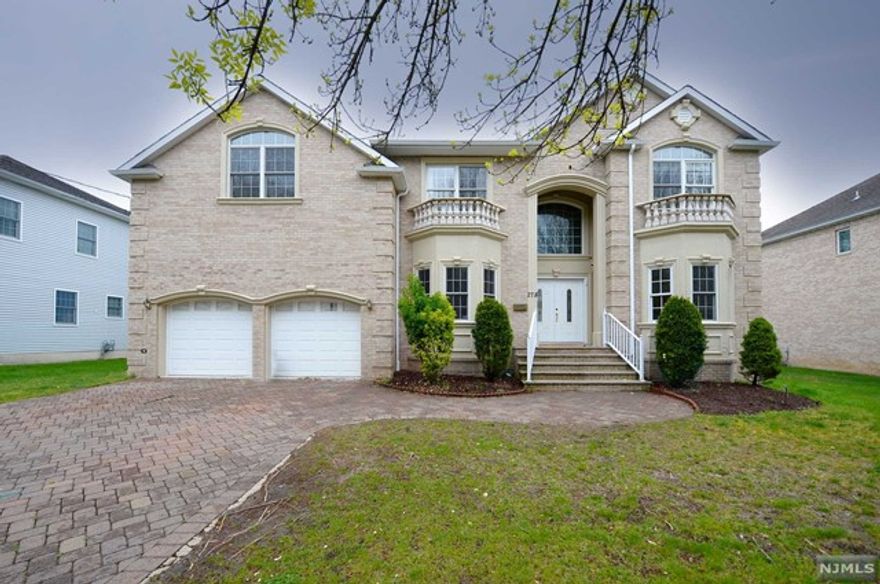 PREPARED TO BE WOWED! Luxurious rental located on a tree-lined street in desired Paramus! This colonial home is warm and inviting with space galore both inside & out. Enter the sun drenched foyer to the 2 story entry hall with high ceilings and open layout floor plan. Living Room, Formal Dining Room, Modern updated Kitchen and Family Room, with paved brick patio to beautiful yard. Full Bath & Office complete this first level. The Second Floor features a Primary Bedroom Suite with a private Bathroom and 4 walk in closets! 3 more Bedrooms and Jack & Jill Bath are down the hall! Great Location near schools, shopping, transportation, and worship!