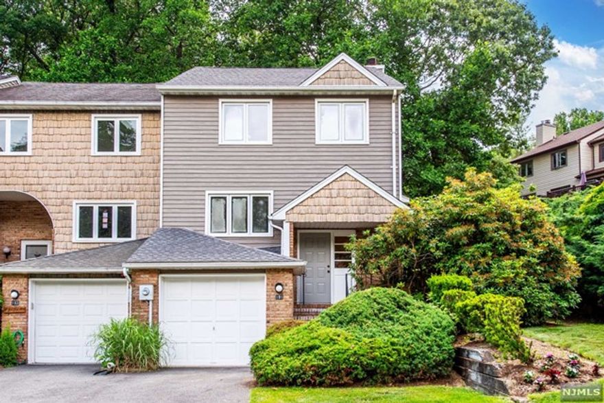 A rare find! Come see this lovely END unit in the heart of Powder Mill Plenty of room to spread out in this 3-bedroom 2.5 bath home w/ full basement. This townhome is flooded with sunlight from 3 windowed exposures. First floor boasts expansive living room with wood-burning fireplace, large eat-in kitchen w/sliders onto a generous deck overlooking a serene and private lushly wooded lot. In addition, there's a separate dining room, and a window-filled den/ home office. Upstairs is a primary bedroom with 2 walk in closets and a beautifully renovated primary ensuite bath w/ radiant heated floors. Two additional bedrooms and a full hall bath, (along with tons of additional closets) complete the 2nd floor. Take advantage of fun recreational amenities like the community pool, tennis courts playground and clubhouse. EZ access to routes 10, 46, 80 and 287 make commuting a breeze! Highly rated Parsippany Schools with Morris Plains address. All this and a very low HOA! A true gem!