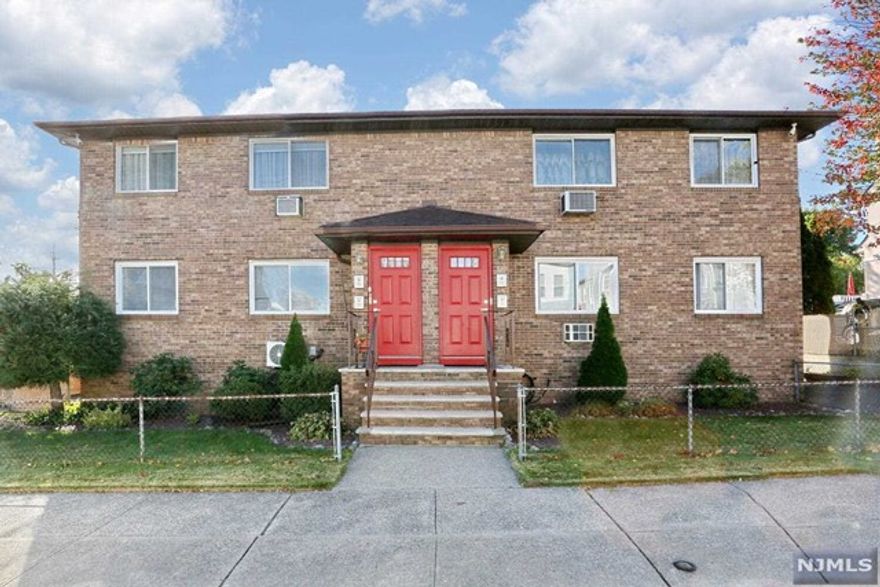 Welcome to this beautifully updated 1 bedroom 1 bath condo close to shopping, dining, mass transit, highway access, parks and more! This is a first floor unit. You will be wowed entering the living room with coffered ceiling, stone work, wainscoting throughout, electric fireplace and built in desk nook. The kitchen offers plenty of space with updated cabinets, newer refrigerator and dishwasher, white subway tile backsplash, new flooring and a custom breakfast area with bonus storage. The bedroom is large with plenty of light and excellent closet space. The full bathroom has also been updated, and there is laundry access in the unit. Gleaming hardwood floors are throughout the unit. A separate storage area basement is accessible in the rear of the building and has additional laundry hookups and utilities. There are 2 dedicated off street parking spots with the option of permit street parking. Come see this lovely property today!