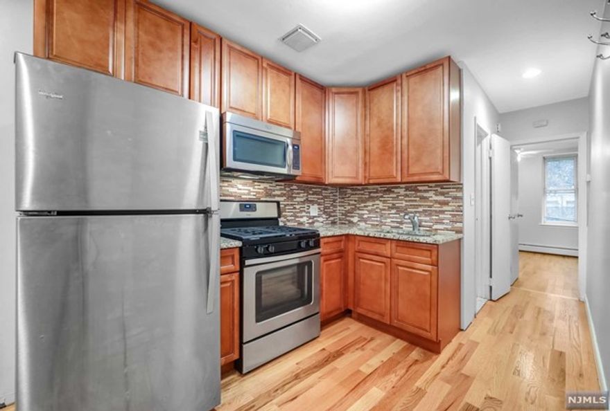 Centrally located, beautifully updated 1 bed, 1 bath, first floor unit! Enter into the kitchen & living room with a hallway leading to the bathroom and bedroom in the back. Hardwood floors throughout. There is a spacious shared patio in the back. Come enjoy the fabulous lifestyle in Hoboken, New Jersey!