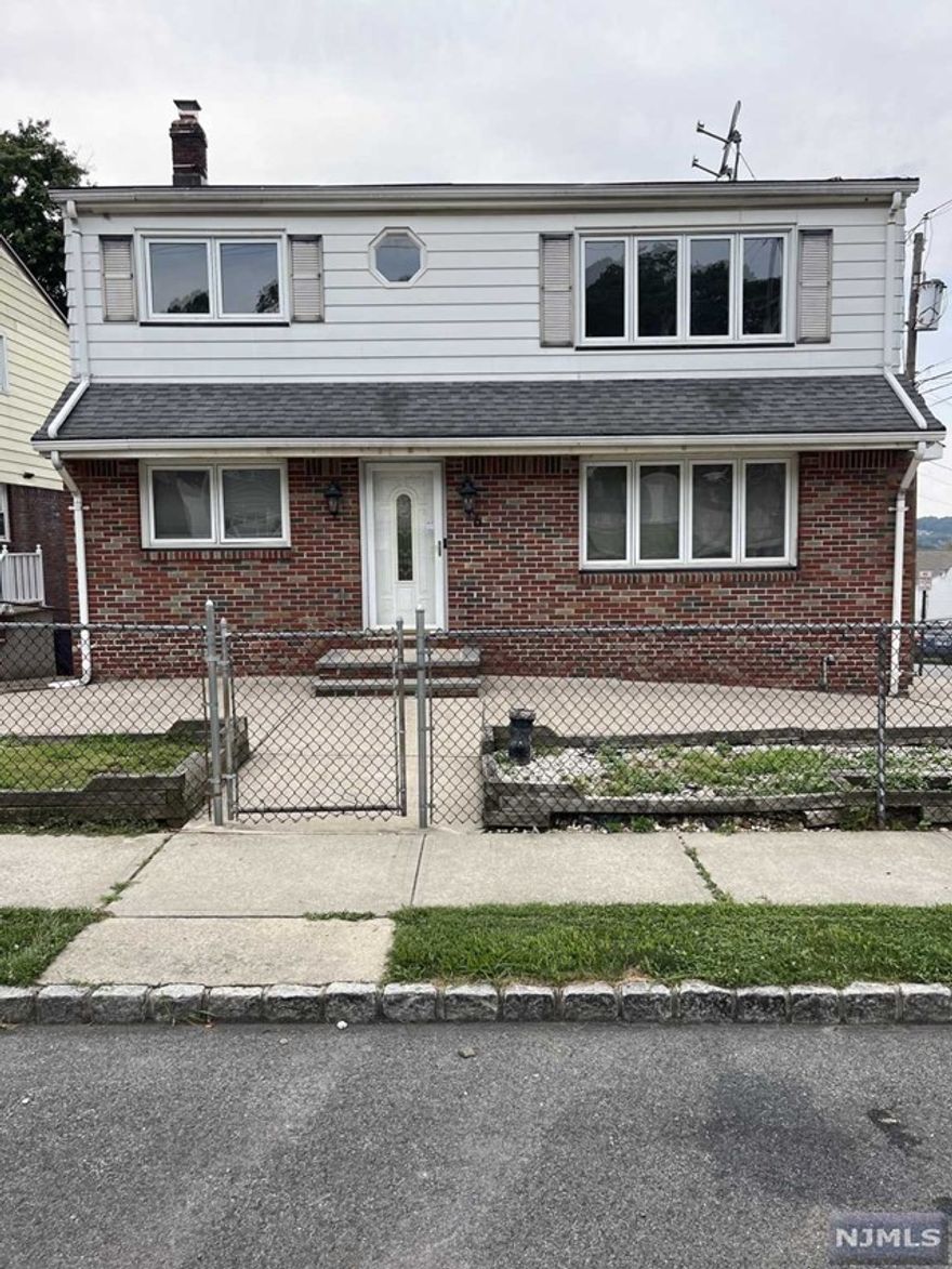 Welcome to your new home! This beautifully renovated 2-bedroom, 1-bathroom apartment offers a blend of modern convenience and spacious rooms. Perched atop a hill, enjoy lovely views and a peaceful environment. The kitchen boasts brand new appliances, perfect for all your culinary adventures. Gorgeous hardwood floors throughout add warmth and elegance to the space. Enjoy a sleek and stylish bathroom with all new fixtures and finishes. Situated on the 2nd floor, this apartment is just minutes away from the train station and major highways, making your commute a breeze. Close proximity to shopping centers means you'll have everything you need within easy reach. This apartment is perfect for those seeking comfort, convenience, and a touch of luxury. This apartment offers 1 off street parking spot. The Elementary School is just 1 Block away as well. Don't miss out on making this your new home!