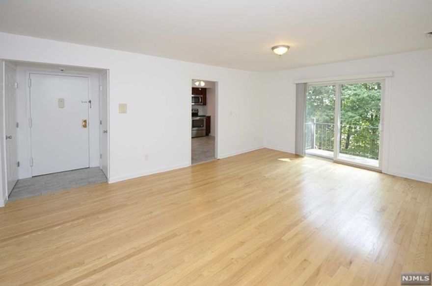 SPACIOUS AND WELCOMING 2 BEDROOM 2 BATHROOM APARTMENT ON THE THIRD FLOOR OF A WELL MAINTAINED COMPLEX IN DESIRABLE RIDGEWOOD. THIS APARTMENT FEATURES A NEWER MODERN KITCHEN, LARGE DINING AREA THAT EASILY FLOWS INTO A LARGE LIVING ROOM. THE VERY LARGE AND SPACIOUS PRIMARY BEDROOM FEATURES A WALK IN CLOSET, PRIMARY BATHROOM SUITE. THIS APARTMENT SHOWCASES AMPLE STORAGE AND CLOSET SPACE ALL THROUGHOUT! APARTMENT IS EQUIPPED WITH CENTRAL AIR, BASEBOARD HEATING, 1 PARKING SPACE INCLUDED ON A FIRST COME FIRST SERVE BASIS OR GARAGE PARKING IS AVAILABLE TO RENT AND LAUNDRY ROOM LOCATED IN THE COMPLEX. EXTRA STORAGE UNITS AVAILABLE AT COST. THIS IS PERFECTLY LOCATED WITH TRANSPORTATION BEING STEPS AWAY, NEAR MOST MAJOR HIGHWAYS, SCHOOLS, SHOPPING AND RESTAURANTS