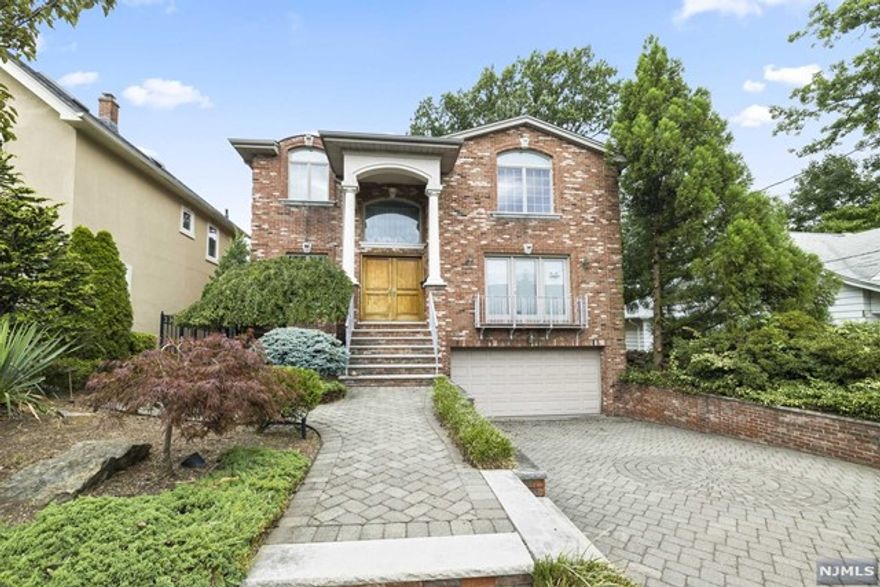 Beautiful custom-built home in prestigious Englewood Cliffs! Ground floor is perfect for extended family with private entrance. High-end finishings throughout the house. Fenced yard. Close to the George Washington Bridge and to shopping centers in Fort Lee. Credit check and interview required.