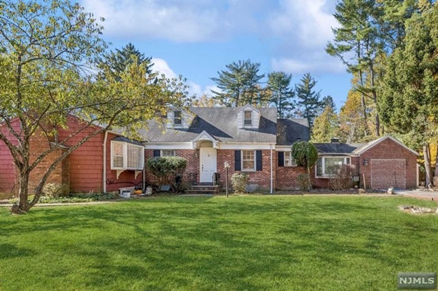 Beautiful Ranch-style home on a large private lot. Detached garage and plenty of parking. First floor has a beautiful sunny family room with fireplace, dining room, kitchen with all new appliances and separate eating area. Mud room/Breezeway leading to large deck and private yard. First floor Primary bedroom with large ensuite bath, walk-in closet and private sunroom. 2nd Bedroom and newly updated powder room finish this floor. Upstairs there is a 3rd bedroom with private bathroom and walk-in closet. Surrounded by nature, this is a great find in a Harrington Park.