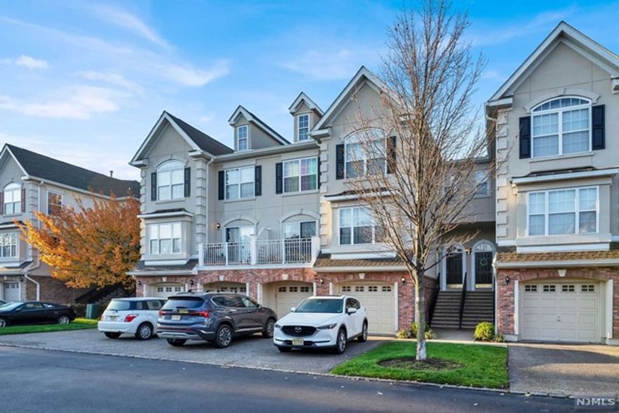 Bright and airy 2 bedrooms/2.5 baths with a finished walk-out basement/ Family room and a private garage, 3 level townhouse boasts up to 1886 Sq feet (Tribeca) of living space, in desirable Riverside court Community. The first floor features an open floor plan with hardwood floors throughout, living room, dining room, and kitchen with granite countertops, 10 ft ceilings, recessed lighting & terrace. Top floor features a large Master bedroom suite with beautiful cathedral ceiling that boasts 2 His/ Her walk-in closets, luxurious oversized bathroom with double sinks, soaking tub, separate standing shower & balcony. Guest bedroom, Guest bathroom & a separate Washer dryer/ laundry completes the second level. Carpet in both the bedrooms. The walk-out ground floor provides an over-sized family room ideal for entertaining, & and access to the one car garage, Driveway Parking & glass slider to Outdoor Patio/ grilling area & yard.