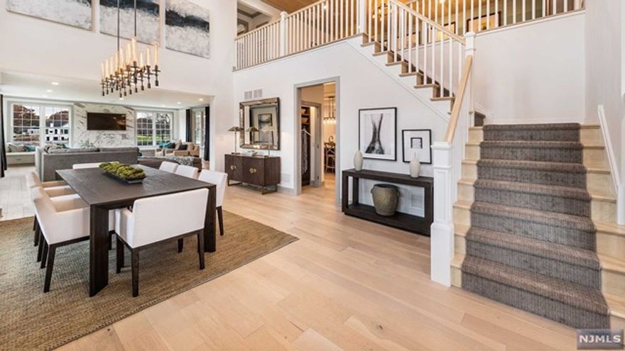 This home features a contemporary flare, perfect for your versatile urban lifestyle. The stunning 2 story foyer is flaked by an open-concept home office flowing into the impressive formal dining room. The well designed gourmet kitchen is highlighted by a large center island, breakfast area and located adjacent to the great room. The second floor primary bedroom suite boasts a seating area, luxurious en-suite bathroom and a spacious walk-in closet including custom built ins. The well designed second floor also includes two additional bedrooms, hall bath and large versatile loft space open to the foyer below. Additional desired features include a private covered porch with views of our award winning clubhouse as well as the Franklin Lakes Preserve. Enjoy the beauty that lies within our community along with the maintenance free lifestyle!