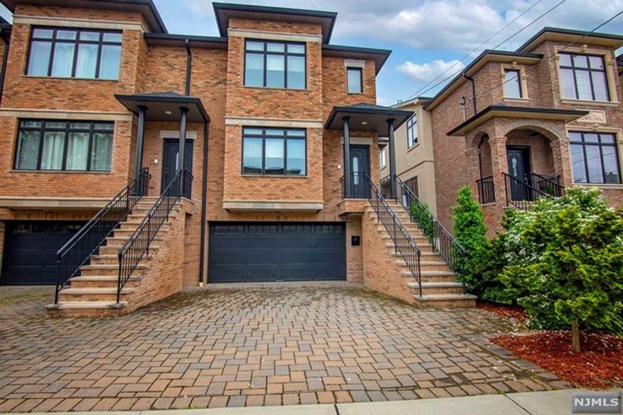 Welcome to this young, brick townhouse (built in 2016) offering over 2000 square feet of living space with gleaming hardwood floors. Step into the spacious living room with gas fireplace and beautiful natural light. The open floor plan leads you into the dining room and modern eat-in-kitchen. Granite counter tops, stainless steel appliances, sliding glass doors to the deck and powder room complete this floor. Continue upstairs to the large primary bedroom with an en-suite bath, 2 additional bedrooms, full bath and laundry. The lower level is fully finished with an additional half bath and access to the private patio and 2 car garage. Come for a tour and make this beautiful townhouse your new home! Highest & Best Tuesday, June 4th By 12:00 Noon.