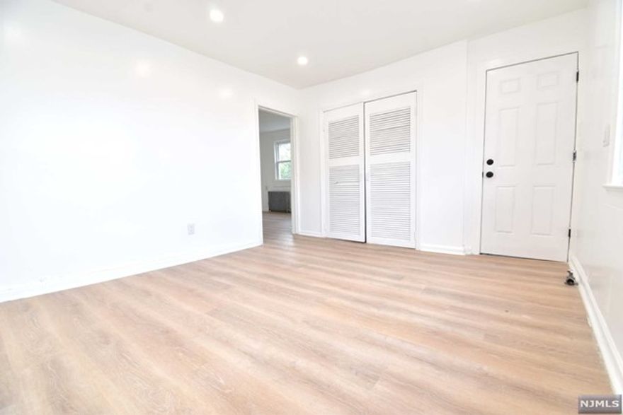 This charming 2-bedroom, 1-bath apartment is bathed in natural light, creating a warm and inviting atmosphere. The expansive eat-in kitchen features sleek stainless steel appliances, perfect for both everyday meals and entertaining guests. Host dinners in the formal dining room or relax in the spacious living room, designed for comfort and style. The bonus room adds versatility, offering the ideal space for a home office, playroom, or additional guest area.