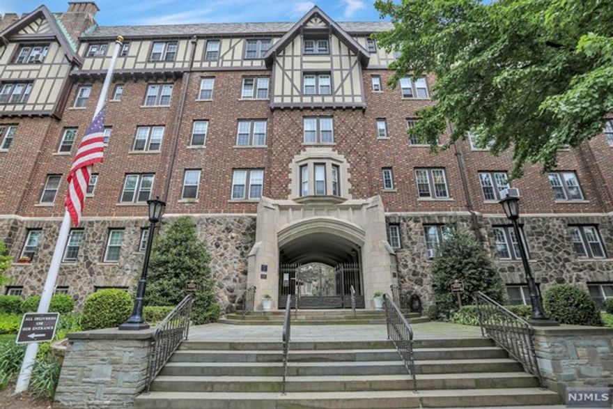 Stunning! Old world charm with elegance galore! This Condo unit located in a pre-war historic building truly has the most amazing feeling from the moment you open the door. Walk in to the huge entry hall with soaring 9 ft ceilings and sun filled atmosphere. Off the hall is the most magnificent State of the Art kitchen with top of the line appliances, a huge den, and a dining room which can also be used as a 3rd bedroom. Down the hall are two large bedrooms and a beautiful renovated bathroom. Floor plan is terrific! In addition this apartment has been completely remodeled w/newer casement double pained windows,hardwood flooring, custom book shelves, all new electric, recessed lighting and is in tip top condition. Great bonus is the covered parking and a huge storage area! Close to all major highways, houses of Worship and bustling downtown. Do not miss! This unit is outstanding!!!