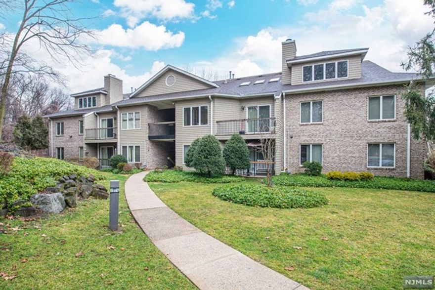 Bright and sunny 3 bedroom loft unit located on the 2nd floor with garage in an elevator building. Living Room w cathedral ceilings, wood burning fireplace and 3 skylights w slider to trex deck. 1st floor master bedroom with ensuite bath plus additional bedroom. 2nd floor has another large bedroom that can be also used as an additional master bedroom with en suite bath and gas fireplace. 2nd floor loft Plenty of walk in attic storage and an abundance of closets. New water heater ( 2022 ) AC and furnace rebuilt by PSEG in 2023 with a 10 year warranty.