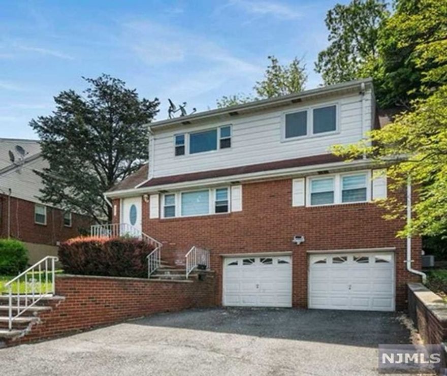 2nd floor of 2 family house. one garage and two car parking spaces. All Hardwood floor, all day sunny and bright. Large living area, enough size two bedrooms, big kitchen with combination washer /dryer . updated bathroom, wall air conditioning system.