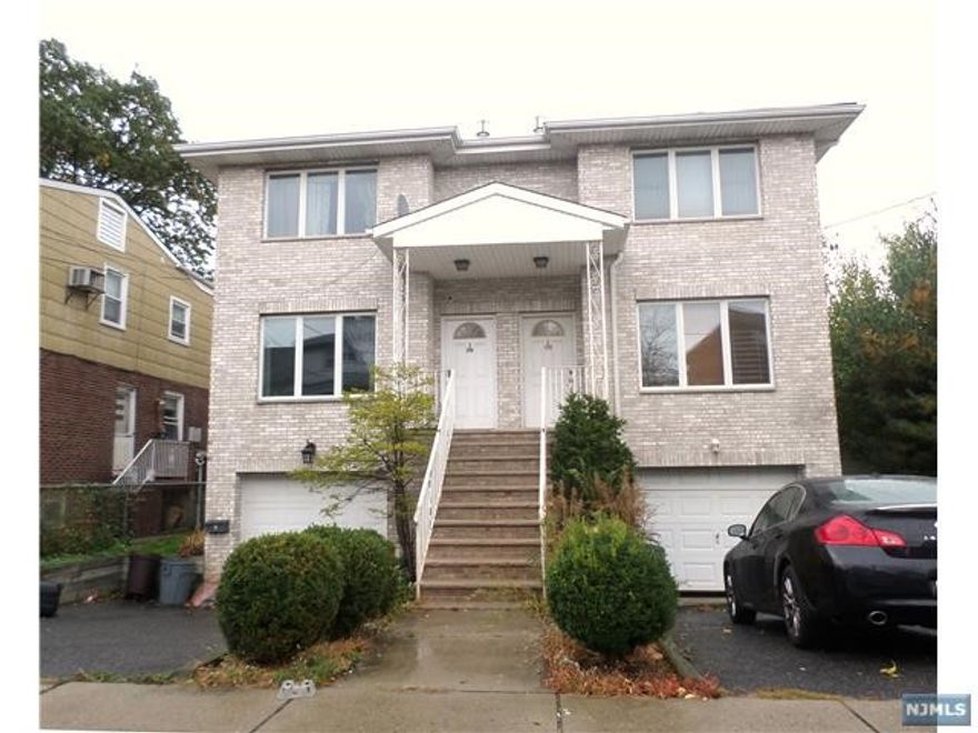 CONVENIENTLY LOCATED 3BR, 2.5BTH UNIT. FEATURES INCLUDE, SEPARATE DINING AREA, LARGE WINDOWS THROUGHOUT AND HARDWOOD FLOORS. FINISHED BASEMENT CAN BE USED AS A REC ROOM, OFFICE OR GUEST ROOM. LAUNDRY ROOM ALSO IN BASEMENT. EASY ACCESS TO MASS TRANSIT TO NYC AND CLOSE TO SCHOOLS AND SHOPPING.