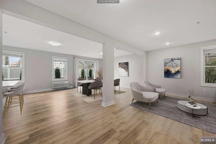 'Currently designed' two bedroom, three full bath, two level condo, which feels more like a townhouse! Tucked away a very short block from town, this special home offers privacy, and the ability to create a private oasis, 'out back'. This six unit building offers a semi private garage, as well as a driveway space. Enjoy the luxury of public transportation, steps away, as well as the convenience of shopping, and the array of authentic cuisines, which Cliffside Park is known for. Cliffside Park borders many towns, including Fort Lee & Edgewater, and is just a few miles to either the George Washington Bridge or Lincoln Tunnel, in either direction. This centrally located home, offers the perks of residing in a 'suburban type' hub of NYC. The VIRTUAL TOUR link for this listing contains an enormous amount of relevant information including a comprehensive video tour, written description, additional photos, floor plans, and interactive 3D model of the home.