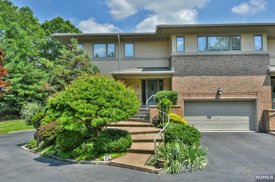 This is it! These coveted units in beautiful Fox Run don't become available often! Backing the Celery Farm Parkland, this is a nature lover's oasis. Immaculate 3BR/4FB unit boasts large open dining room & living room w/fpl, a beautiful kitchen w/abundance of cabinetry open to the family room w/matching custom built-ins & sliding doors to the terrace w/stunning nature views. The main floor also has a private office set apart from the main living space adjacent to a full bath, ideal for 1st flr guests if needed. The 2nd flr boasts large primary suite w/walk-in closet, lrge private bathroom & custom painted tray ceiling, two addl bedrooms, a full bath & laundry. One BR has built-in Murphy Bed & custom cabinetry. Totaling approx 3586 sq ft of livable space on all 3 levels incl finished basement w/full bath & walk-out to patio. Two car attached garage with large adjacent storage room. Enjoy all the beautiful town of Allendale has to offer with the ease of townhouse living!