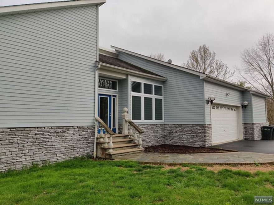 Spacious, luxurious 4081 sq ft contemporary home offers one level living w/ 4 bedrms & 4 full baths located in the town of Wallkill, NY on 6.5 private acres with seasonal lake views & use of an inground pool for summer fun. PLUS FULL FINISHED BASEMENT AND STORAGE.Tenants pays electric and oil. LAWN MAINTENANCE & SNOW REMOVAL ARE INCLUDED! Enter into the three season enclosed porch to a grand entry with soaring ceilings & sitting area. Prepare meals in you gourmet kitchen & entertain in the formal dining area & family room w/ fireplace overlooking your backyard oasis with large deck and pergola. Enjoy sipping your favorite beverage in outdoor atrium, the focal point of this amazing home. First floor master bedrm has a spa bath with jacuzzi tub, plus three other spacious bedrms w/ ample closet space. Two car garage and walk up office space/storage area is included. Private laundry. PET FRIENDLY w/ landlord approval. Convenient to major highways, bus transportation to NYC, golf.