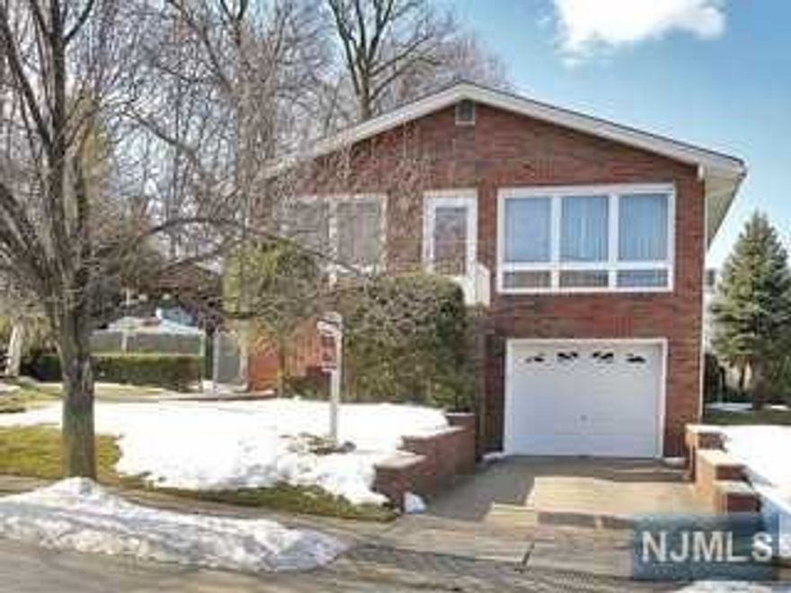 3 Br 1.5 bath home. hardwood floors. Large full unfinished basement. Within minutes to New York City, George Washington Bridge, buses, shopping, etc. Attached garage. Fenced in private backyard.