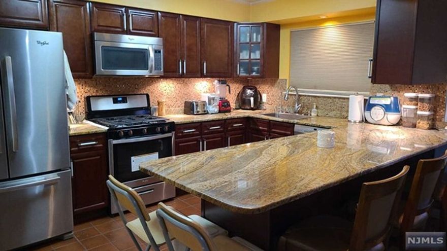 Fantastic 2 bedroom/2.5 bath duplex (Shea Model) with 1718 sq.ft. of open living space. Sunken living room with wood burning fireplace for lovely ambiance. Private outdoor terrace with peaceful garden views. Hardwood floors, central AC/heat, in-unit washer/dryer, lots of closet space. Covered parking for 2 cars w/storage unit in carport. Master bedroom with walk-in closet and master bath. Harmon Cove is a wonderful gated community with many premium amenities including 24hr security, pool area w/clubhouse with kitchen/bar, play area for the kids, basketball/tennis courts, and marina, to name a few. Easy NYC commute with transportation on site! Credit/background check, rental application & proof of ability to pay required. 1 month broker fee paid by tenant. Available 12/1/22.