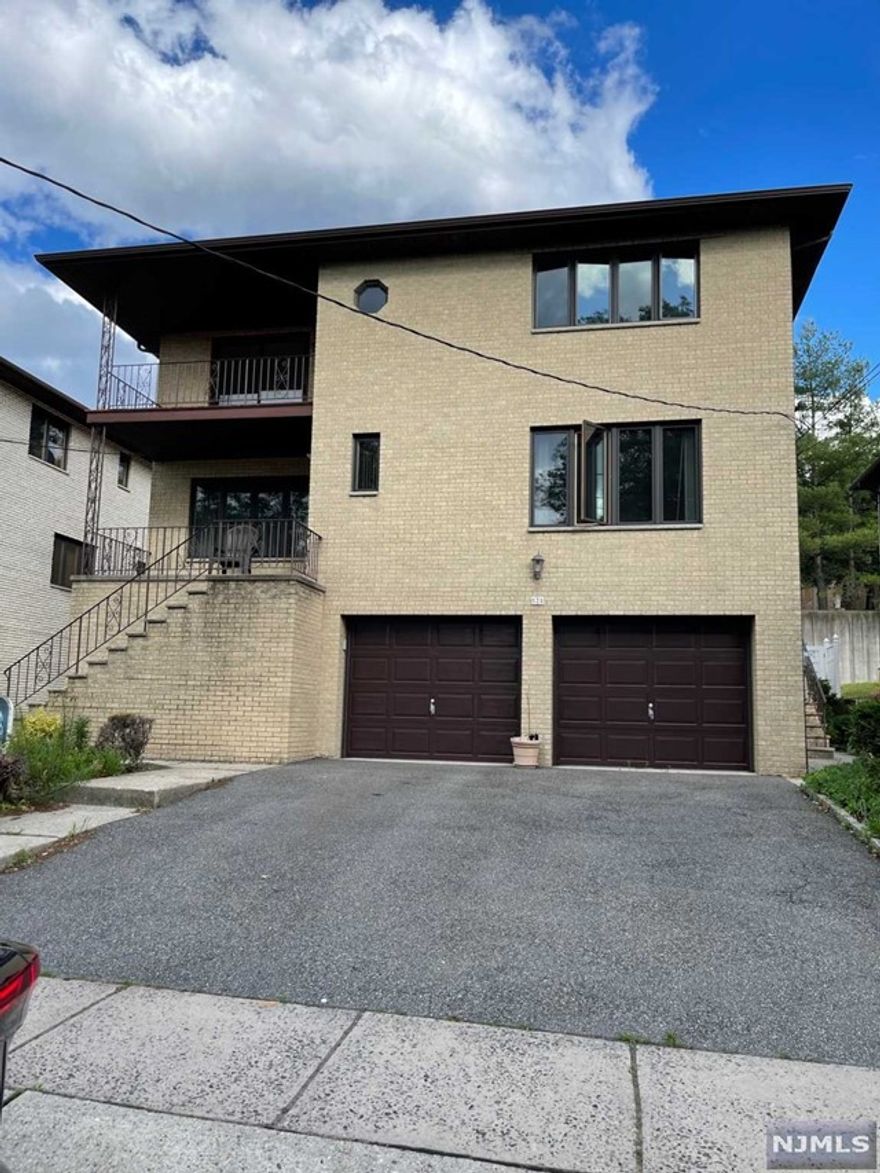 Enjoy living at this bright and spacious 3 bedroom apartment on the 2nd floor. Large kitchen, dining room and living room leading to private terrace. Freshly painted, new kitchen floor and new appliances. Close to worship, schools and public transportation. 1 parking spot in driveway and 1 in garage. No pets!