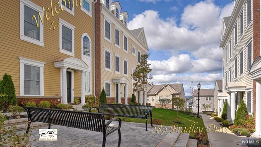 Recently built upgraded NY Style Townhouse at the Wesmont Station Complex. This beautiful detached home is an end unit, situated at the end of a cul-de-sac, offering a tranquil & serene environment. Step inside & be greeted by the beautiful hardwood floors, ceramic tiled floors, & 10 foot high ceilings that add a touch of elegance to the space. The main floor is an open concept layout that creates a seamless flow between the living room, dining room, & kitchen with a large breakfast bar island, making it perfect for entertaining. The Owner's ensuite is a true retreat featuring 2 large walk-in closets & a full bathroom. Enjoy the view from the large deck just off the dining room. It's the perfect spot to enjoy your morning coffee or host summer barbecues with friends & family. This energy efficient home also boasts marble countertops, a fireplace, & a family room on the ground level to greet your guests. Located just a short walk away from the train or bus to New York City.