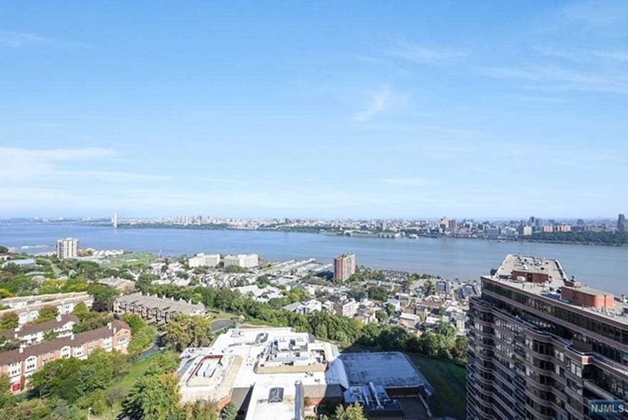 Welcome to this exquisite three bedroom condo, offering breathtaking views of NY and the GW Bridge.Stunning granite floors in the LR/DR area and entrance foyer. Rich, dark, mahogany floors in the bedrooms. Recessed ceiling lights that add depth, dimension and ambience. The condo boasts two full marble bathrooms and one meticulously tiled, showing contemporary design and functionality.All closets are built-in and seamlessly blend with the interior aesthetics and provide ample space to keep your belongings organized and out of sight. Woodwork window paneling in LR/DR and Primary bedroom covering heating/air conditioning units. Solid wood interior doors. Close to schools, shopping and commute to NYC. Parking indoors $75, outdoors $58, Tandem $116, motorcycle $32. Additional storage closet on the floor. 24 HR. Doorman, Swimming pool, Kiddy pool, Children's playground, Tennis Court, Basketball court and State of the Art gym coming soon