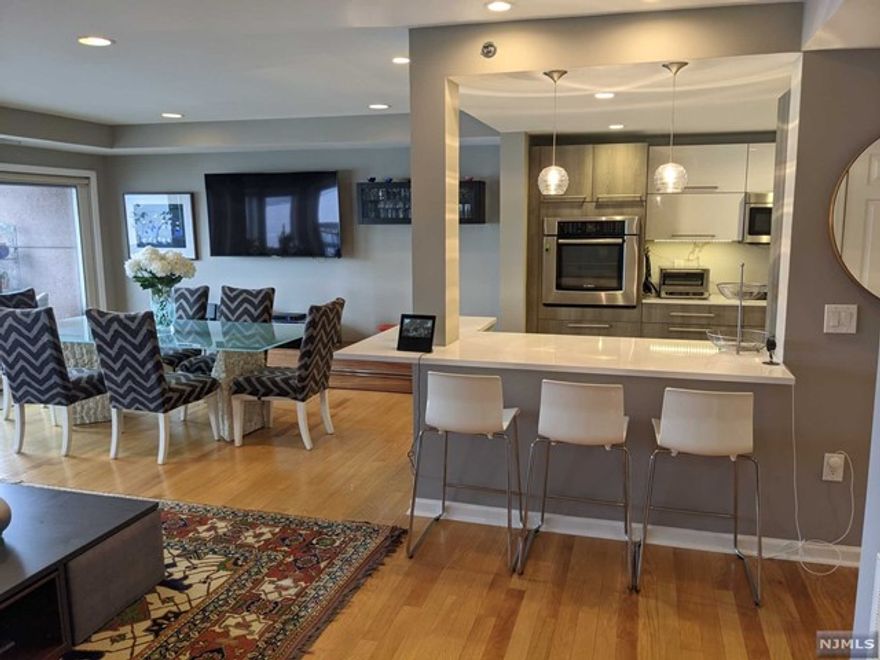 "INEPENDENCE HARBOR" THE OPPORTUNITY OF A LIFETIME...ONCE IN A RARE WHILE SOMETHING VERY SPECIAL BECOMES AVAILABLE...THIS LUXUORIOUS HOME HAS BEEN REMODELED (EUROPIAN STATE OF THE ART GOURMET KITCHEN/BREAKFAST COUNTER AND MORE)...FEATURES 2 TERRACES AND MOST MAGICAL UNOBSTRUCTED 180-DEGREE VIEW OF THE HUDSON RIVER NEW YORK CITY AND G W BRIDGE...BEATIFULL WOOD FLOORS...2 DEEDED INDOOR PARKING SPACES...24 HOUR GATEHOUSE, POOL,TENNIS, CLUBHOUSE/GYM...COME EXPERIENCE WATERFRONT LIBING AT ITS BEST !!!