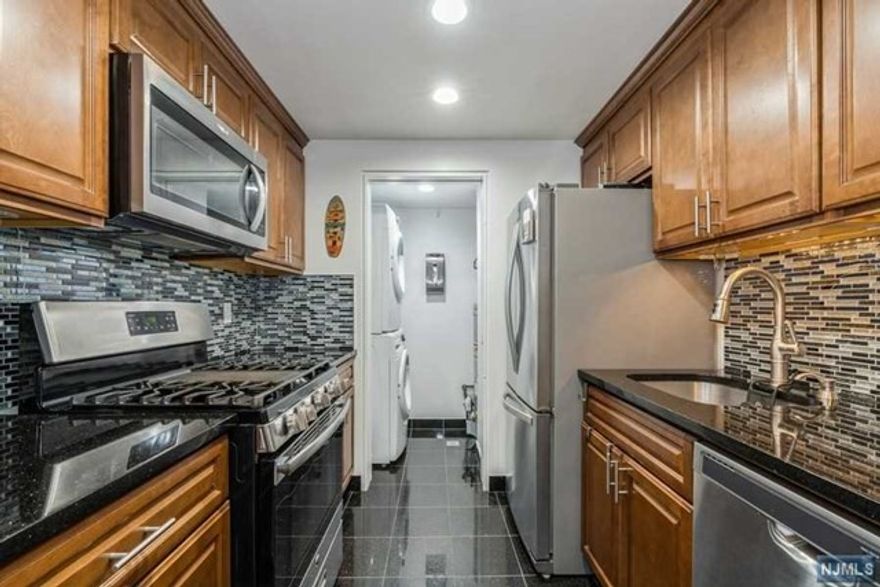 Welcome to your dream condo on 43rd St in Union City! Experience urban living in this modern one bedroom condo featuring sleek granite countertops and bamboo flooring in the living area. Step out onto your private terrace, ideal for unwinding, and enjoy easy access to nearby transportation. With a covered garage parking spot and low maintenance fees, this condo offers both convenience and comfort. Schedule your viewing today!