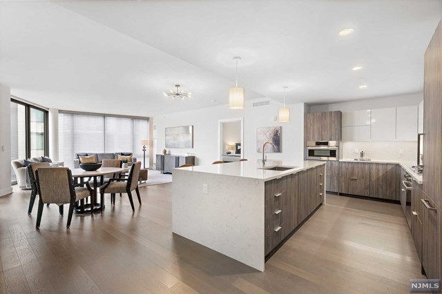 THE CHEN AGENCY presents NINE on the Hudson - Welcome to Residence 1011. This amazing floorplan with an impressive 1541-sf has beautiful southeast Hudson River & Manhattan Skyline views from floor-to-ceiling living room windows. The luxurious open plan central living area is highlighted by an incredible center island kitchen that boasts exquisite cabinetry, stone counters and sophisticated appliances. A glass walled terrace captures the southern sun. In the primary bedroom suite you will find a luxurious bath lined with marble and the finest fittings. The second bedroom is located on the opposite side for optimal privacy. Built in 2018, NINE provides the ultimate lifestyle with 24-hour concierge, vast health club, exceptional resident lounges, pool & barbecue deck, rooftop deck & more. Taxes are based on the PILOT abatement program. Contact NELSON CHEN at 201-886-8000 or Nelson@ChenAgency.com