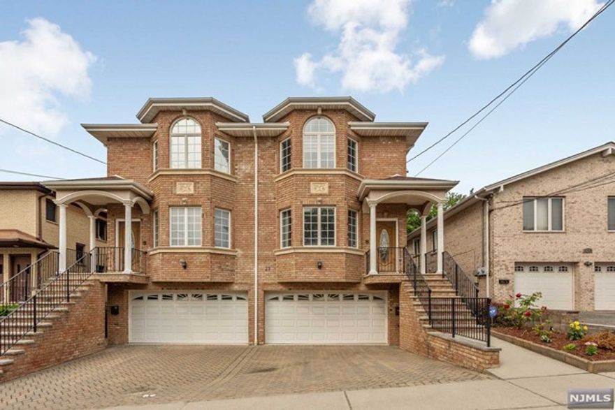 8 years old,south facing,very bright and spacious,on a quiet street in Palisades Park. Entrance has its own coat closet for shoes and coats. Spacious living room opens to dining and large sized kitchen with center island,an extra pantry cabinet. sliding door to deck for picnics/family gatherings. Large master bed room has 2 closets and a 2 sink bathroom with jetted tub and stall shower. All large sized bedrooms are on 2nd floor. The ground floor has its own bedroom with closet and space for living room and full bathroom which has a separate entrance on the side of the house. The private back yard with picnic table and garden is enclosed by a fence. Convenient to dining, shopping, and NYC bus.