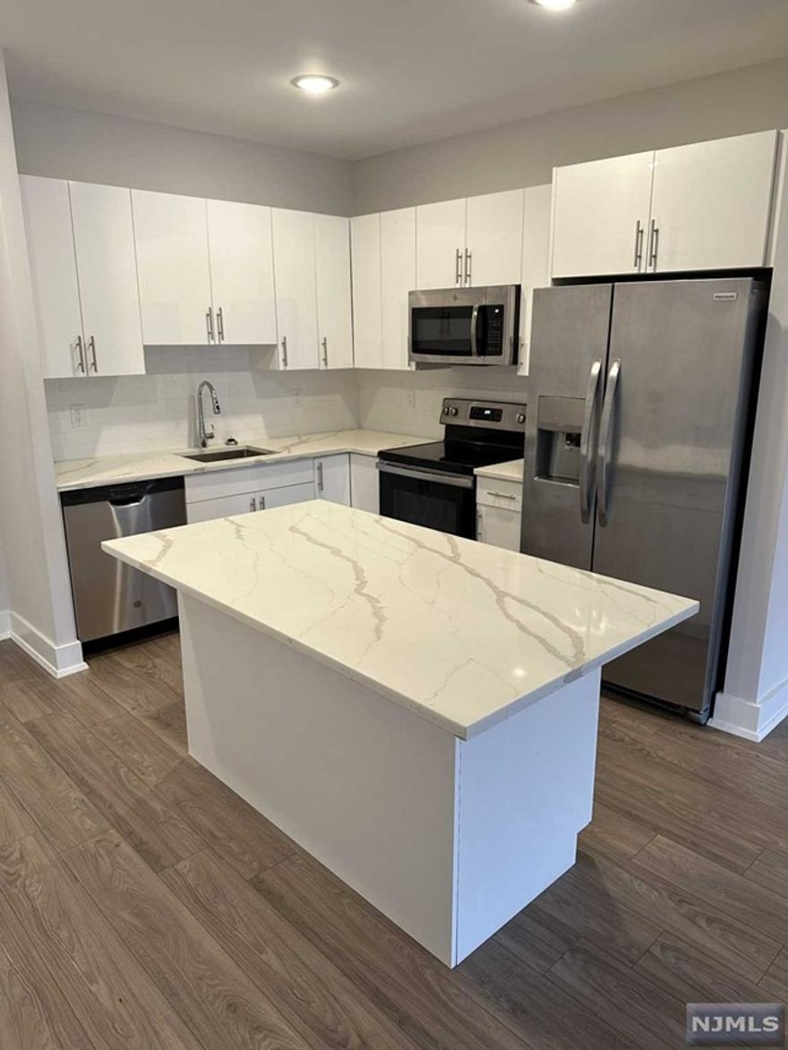 1 parking space INCLUDED, and REDUCED security to qualified applicants - Welcome to The Addison - Fort Lee's new luxury rental building offering a variety of upscale, spacious floorplans. The Addison offers high-end residences fully equipped w/ modern kitchens w/ stainless steel appliances, quartz countertops, full islands & tiled backsplashes, open living/dining areas, shades on all windows, modern bathrooms & a full-sized washer & dryer in each unit. Exclusive 24/7 virtual doorman service for communications, package deliveries & access control via video intercom system linked to your smart phone. The Addison includes a large on-site fitness center including virtual touchscreen workout mirror, electric car charging stations & parking garage w/ direct elevator access to all residences for uncompromising security. Pet friendly ! (LB limit & fees apply) Tenants pay utilities. All amenities & one garage parking space is included.