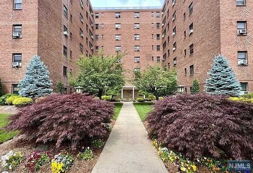 Welcome to Berkley Arms located in the desirable Fairmount section of Hackensack. A clean and well maintained elevator building offering laundry, an onsite super, designated parking space, community room, outdoor pool, and low HOA fees which include heat & water. This top floor unit with warm hardwood floors is incredibly spacious, with an open & flexible floor plan, tastefully renovated kitchen w/breakfast bar, huge king size bedroom, and plenty of closets throughout. Conveniently located just one block from the NYC train & bus and in close proximity to shopping, restaurants, and parks. A fantastic value and great opportunity to own a condo in the heart of the revitalized City of Hackensack!