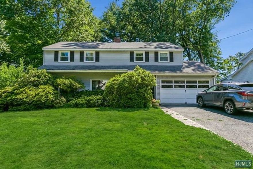 Location, Size, Style! 4 Bedroom Colonial home in the heart of town is available for rent in Tenafly. The size of this lovely home is 2374 sqf. It is conveniently located one block away from NYC bus, park, library, borough hall and down town and very close to all schools. The house features a park-like backyard, an updated kitchen with a large island, first floor bathroom, all hardwood floors, a large sitting room on the second floor, baseboard heating, huge basement, etc. House will be freshly painted and professionally cleaned before move-in.